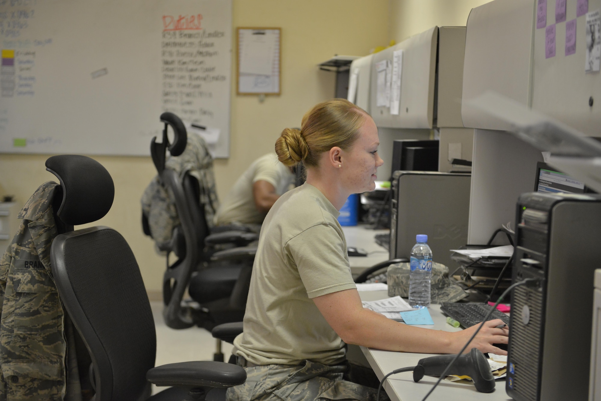 Senior Airman Jennifer Branch, 379th Expeditionary Logistics Squadron consolidated aircraft parts store, checks a  virtual inventory  for bench stocks to give customers correct info on their requested parts May 21, 2015 at Al Udeid Air Base, Qatar. Branch is a native from Kansas City, Missouri and deployed out of Spangdahlem Air Base, Germany. (U.S. Air Force photo/Staff Sgt. Alexandre Montes)      