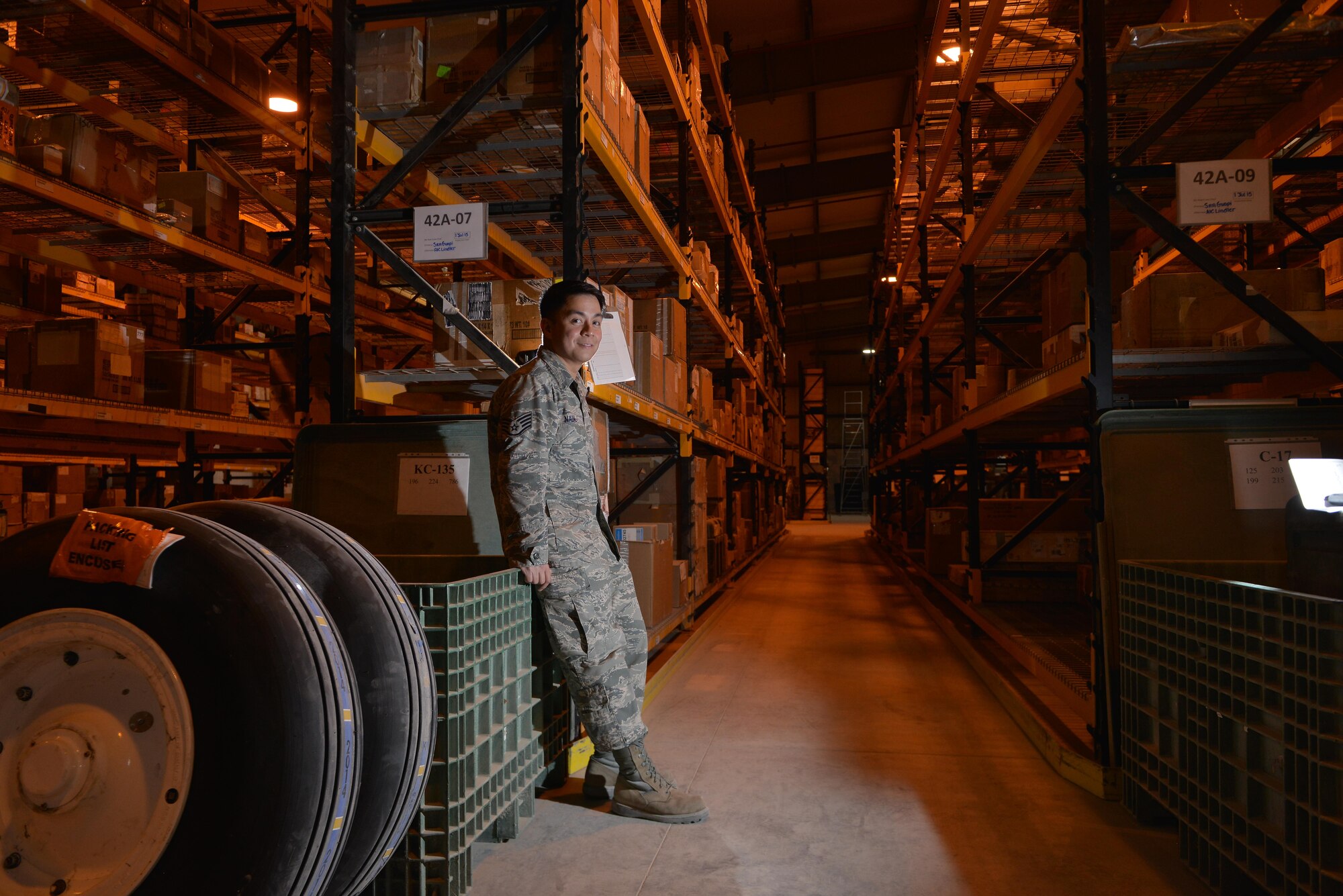 Staff Sgt. Alan Nadal, 379th Expeditionary Logistics Squadron consolidated aircraft parts store, is the noncommissioned officer in charge of the consolidated aircraft parts store here at Al Udeid Air Base. CAPS stores and distributes aircraft parts to maintain six different airframes, and supports several Air Mobility Units as well as delivers to forward operating bases in the AOR. Nadal is a native from Sparks, Nevada and deployed out of Aviano Air Base, Italy. (U.S. Air Force photo/Staff Sgt. Alexandre Montes)       