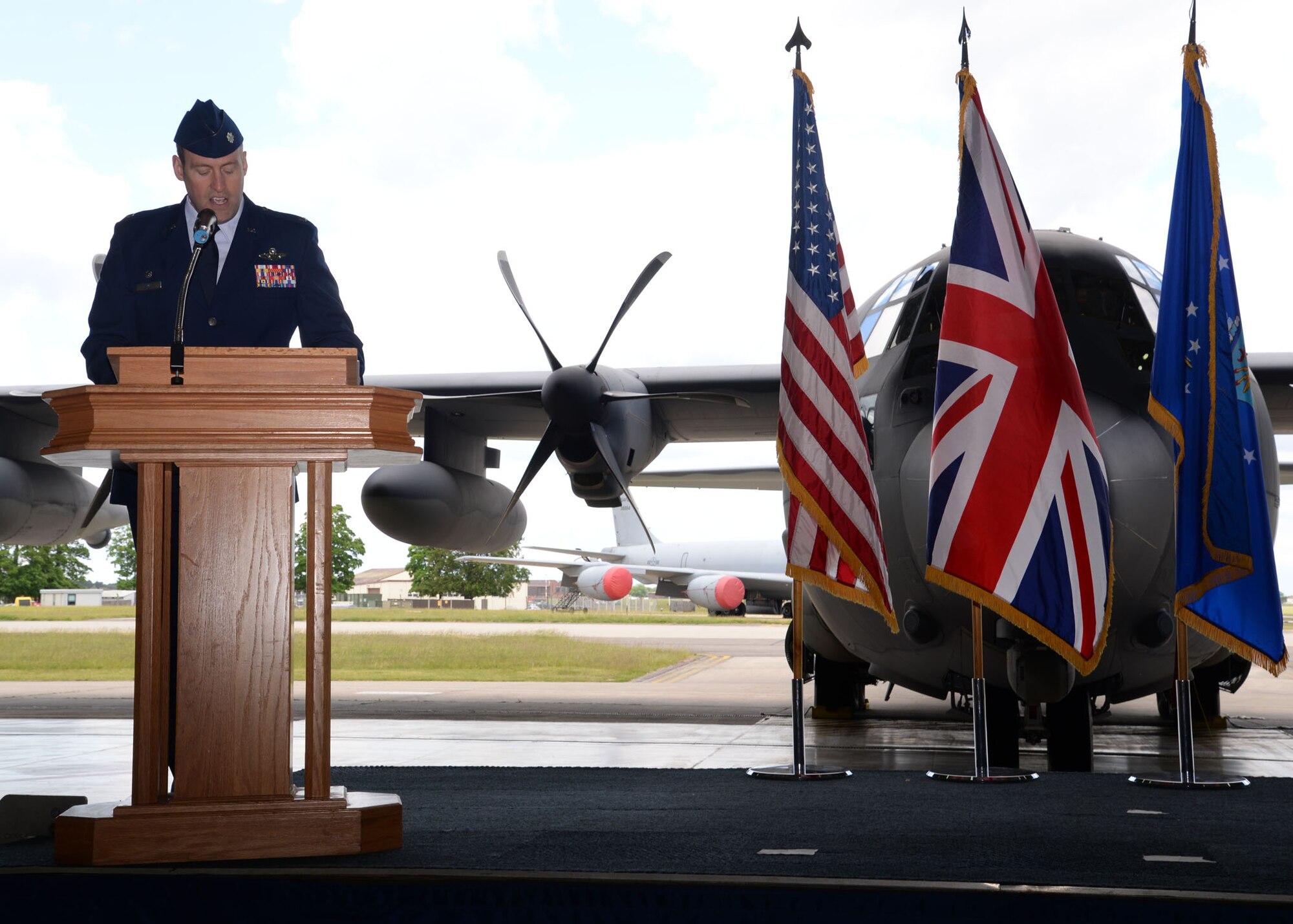 U.S. Air Force Lt. Col. Bradley C. Downs, 67th Special Operations Squadron commander, provides remarks during the change of command ceremony May 28, 2015, in Hangar 803 on RAF Mildenhall, England. The ceremony is a time-honored tradition in which one officer relinquishes command and passes it to another.(U.S. Air Force photo by Senior Airman Christine Halan)