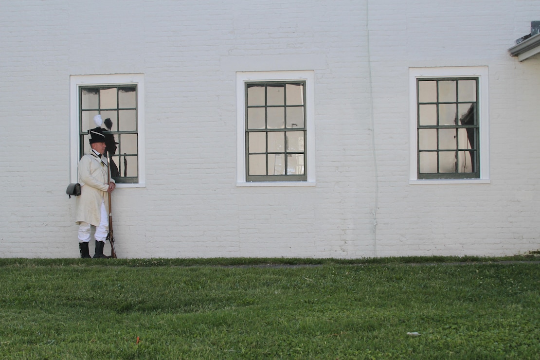 FORT NORFOLK, Va. -- A War of 1812 reenactor rests agains the Officers Quarters/Shell House here June 9, 2012. The reenactors were part of OpSail 2012, which marked the bicentennial of the War of 1812 and brought international tall ships and naval vessels to Hampton Roads and other port cities.  (U.S. Army photo/Kerry Solan)