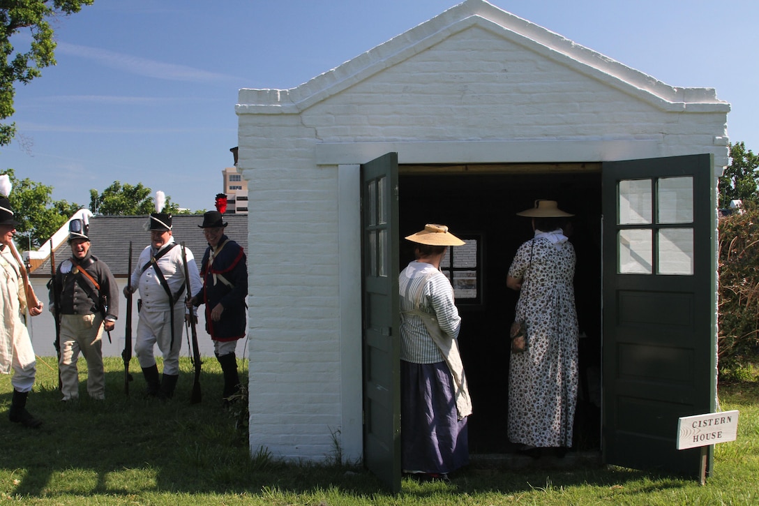 FORT NORFOLK, Va. -- War of 1812 reenactors stand near the fort's cistern here June 9, 2012. The reenactors were part of OpSail 2012, which marked the bicentennial of the War of 1812 and brought international tall ships and naval vessels to Hampton Roads and other port cities. Fort Norfolk is the last remaining of 19 harbor-front forts authorized in 1794 by President George Washington. (U.S. Army photo/Kerry Solan)