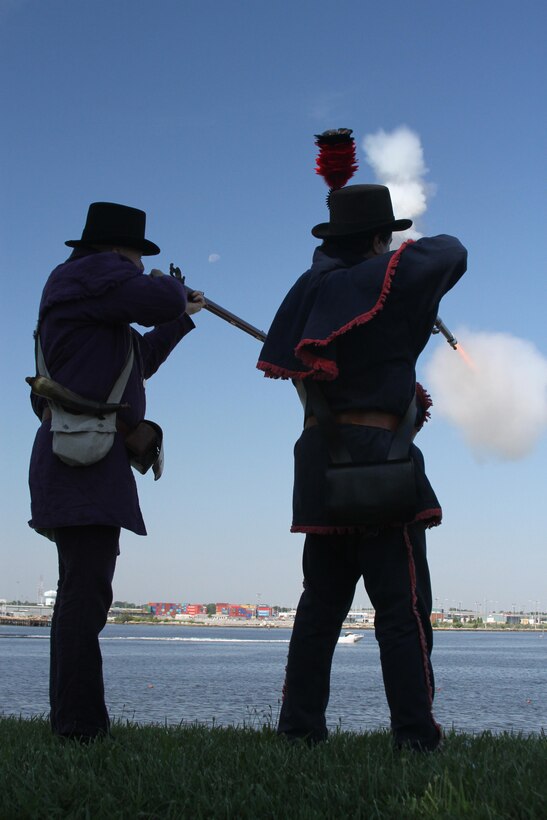 FORT NORFOLK, Va. -- War of 1812 reenactors fire their weapons from the ramparts here June 9, 2012. The reenactors were part of OpSail 2012, which marked the bicentennial of the War of 1812 and brought international tall ships and naval vessels to Hampton Roads and other port cities.  (U.S. Army photo/Kerry Solan)