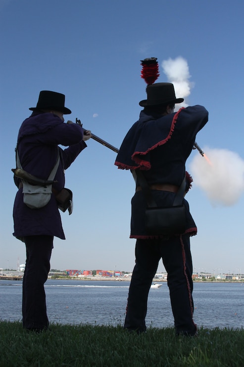 FORT NORFOLK, Va. -- War of 1812 reenactors fire their weapons from the ramparts here June 9, 2012. The reenactors were part of OpSail 2012, which marked the bicentennial of the War of 1812 and brought international tall ships and naval vessels to Hampton Roads and other port cities.  (U.S. Army photo/Kerry Solan)