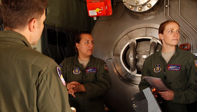 Senior Master Sgt. Tessa Tolle, left, and Master Sgt. Shannon Memmelaar, C-130 MAFFS loadmasters, participated in this year’s MAFFS recertification training May 15, 2015 here. They were part of the ten aircrews who qualified for the mission in 2015 (U.S. Air Force photo/Staff Sgt. Nathan Federico) 