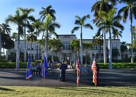 Col. Randy Huiss, 15th Wing commander, speaks during a ceremony commemorating the 80th anniversary of Hickam Field’s dedication on Joint Base Pearl Harbor-Hickam, Hawaii, May 29, 2015. On May 31, 1935 ground was broken at Hickam Field after being designated by the war department in Washington D.C., on May 21 1935. Between October and December 1935, crews cleared 2,225.46 acres that would be Hickam Field. Early installation of infrastructure, initial hangars, and roads were accomplished in 1936 and 1937 as more buildings were completed including the base water tower, operations building, and a number of hangars. The first units were stationed at Hickam Field beginning in September and October 1937. (U.S. Air Force photo by Tech. Sgt. Aaron Oelrich/Released)

