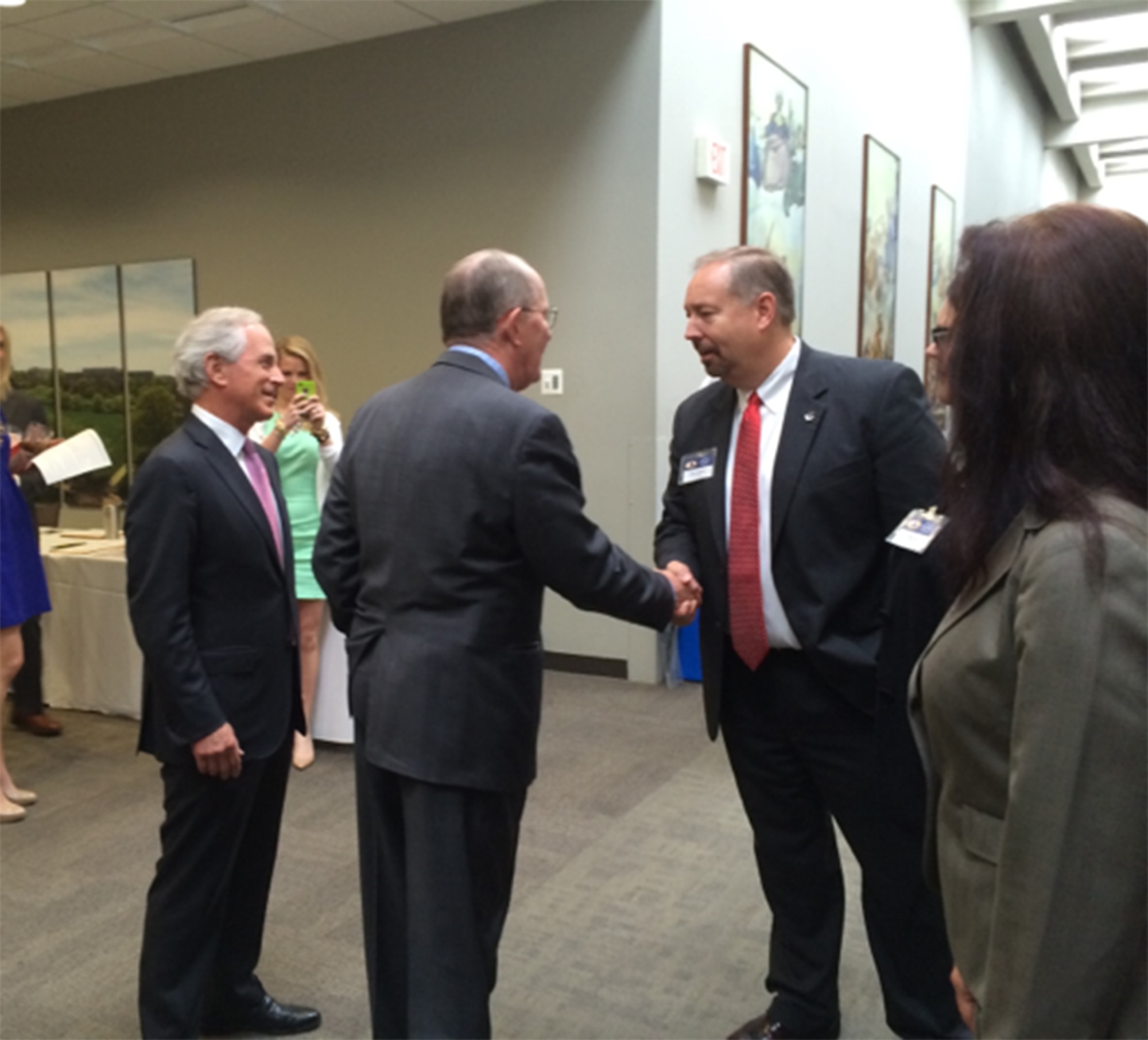 Arnold Community Council member and Air Force Materiel Command Civic Leader, Brian Skelton (right), says hello to Senators Alexander (middle) and Corker during Tennessee Tuesday.