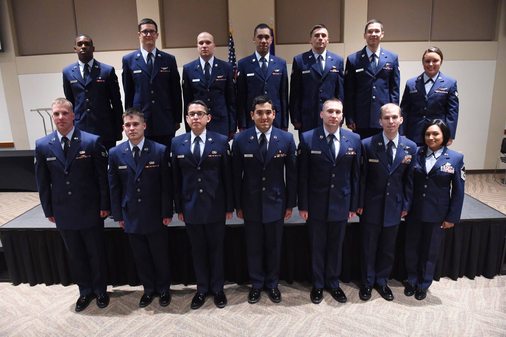 Team Buckley members were promoted to their next ranks May 29, 2015, at the Leadership Development Center on Buckley Air Force Base, Colo. A promotion ceremony is a time-honored tradition in the Air Force, allowing co-workers, family and friends to support and congratulate Airmen on their promotion. (U.S. Air Force photo by Airman 1st Class Samantha Meadors/Released)