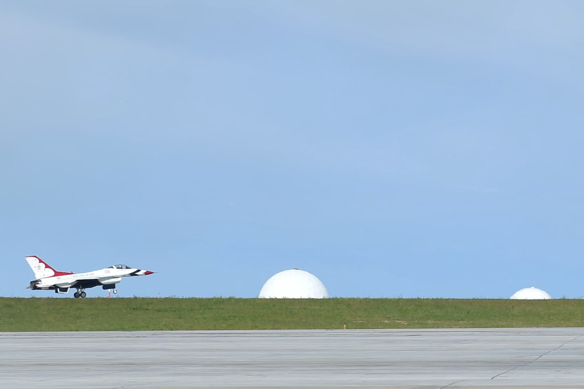 A Thunderbirds jet lands on the flight line May 28, 2015, on Buckley Air Force Base, Colo. The Thunderbird team is staging out of Buckley AFB and will be performing in the 2015 Rocky Mountain Air Show May 30-31. (U.S. Air Force photo by Airman 1st Class Samantha Meadors/Released)