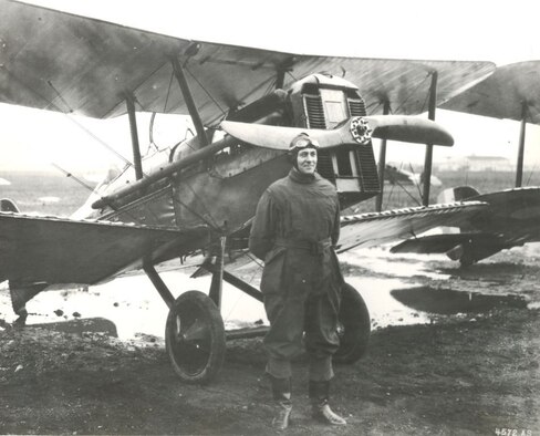 A 1920 photograph of Lt. Col. Horace Hickam with a British Royal Aircraft Factory SE-5 biplane fighter, a World War I era aircraft, taken at Bolling Field, Washington D.C. On May 21, 1935, the War Department in Washington D.C. issued General Orders No. 4 designating the Hawaiian Department flying field as “Hickam Field” in honor of Hickam. The location of the new airfield was to be adjacent to Pearl Harbor on the island of Oahu, Territory of Hawaii. (Courtesy photo by 15th Wing Historian)