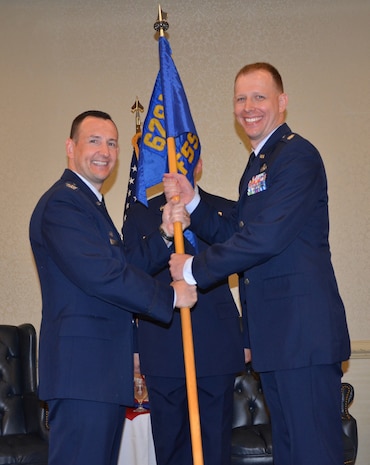 Lt. Col. Joseph Thomas, 628th Force Support Squadron commander, takes the guidon from Col. Michael Mongold, 628th Missions Support Group commander during the squadron's change of command ceremony May 29, 2015 at the Charleston Club on Joint Base Charleston, S.C. Thomas' previous assignment was at Air University, Maxwell Air Force Base, Al., where he was the chief of Protocol. (U.S. Air Force photo/Jessica Donnelly)      

 

The Joint Base Charleston 628th Force Support Squadron held a change of command ceremony May 29, 2015 at the Charleston Club to recognize the outgoing commander, Lt. Col. Jennifer Judd, and welcome the incoming commander, Lt. Col. Joseph Thomas. (Photo by Jessica Donnelly, 628th FSS Marketing)
