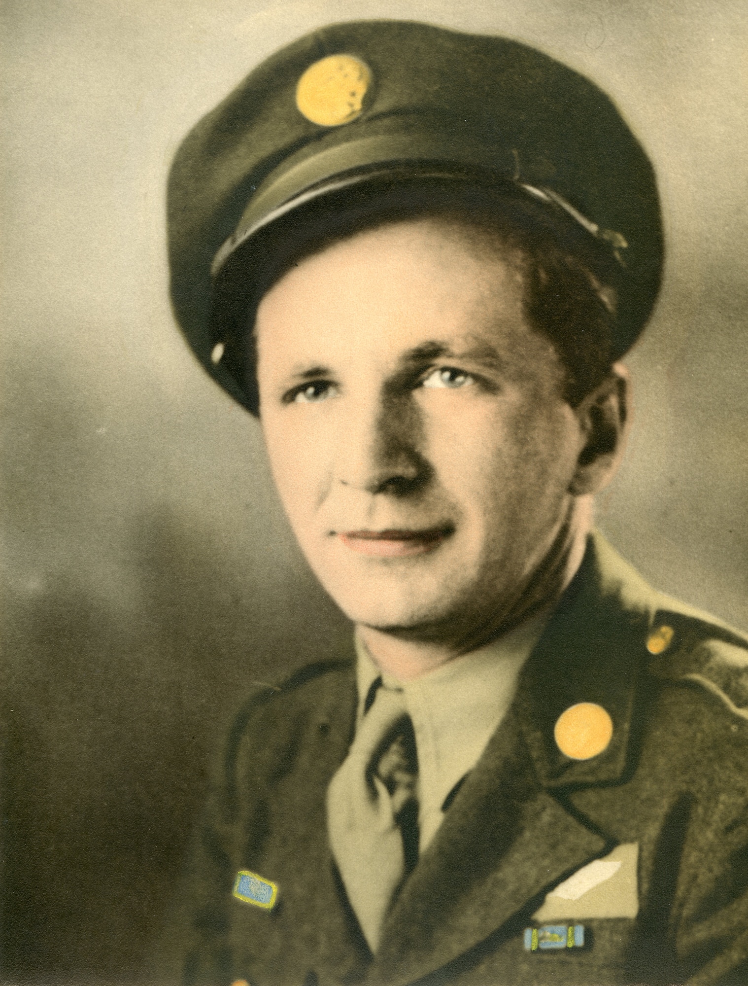 Tech. Sgt. Edward Herzog, 333rd Squadron, 94th Bombardment Group flight engineer, poses for a portrait in 1944. Herzog served as a B-17 flight engineer in World War II and his uniform is now preserved in Joint Base McGuire-Dix-Lakehurst’s U.S. Army Reserve Mobilization Museum. (U.S. Air Force photo)
