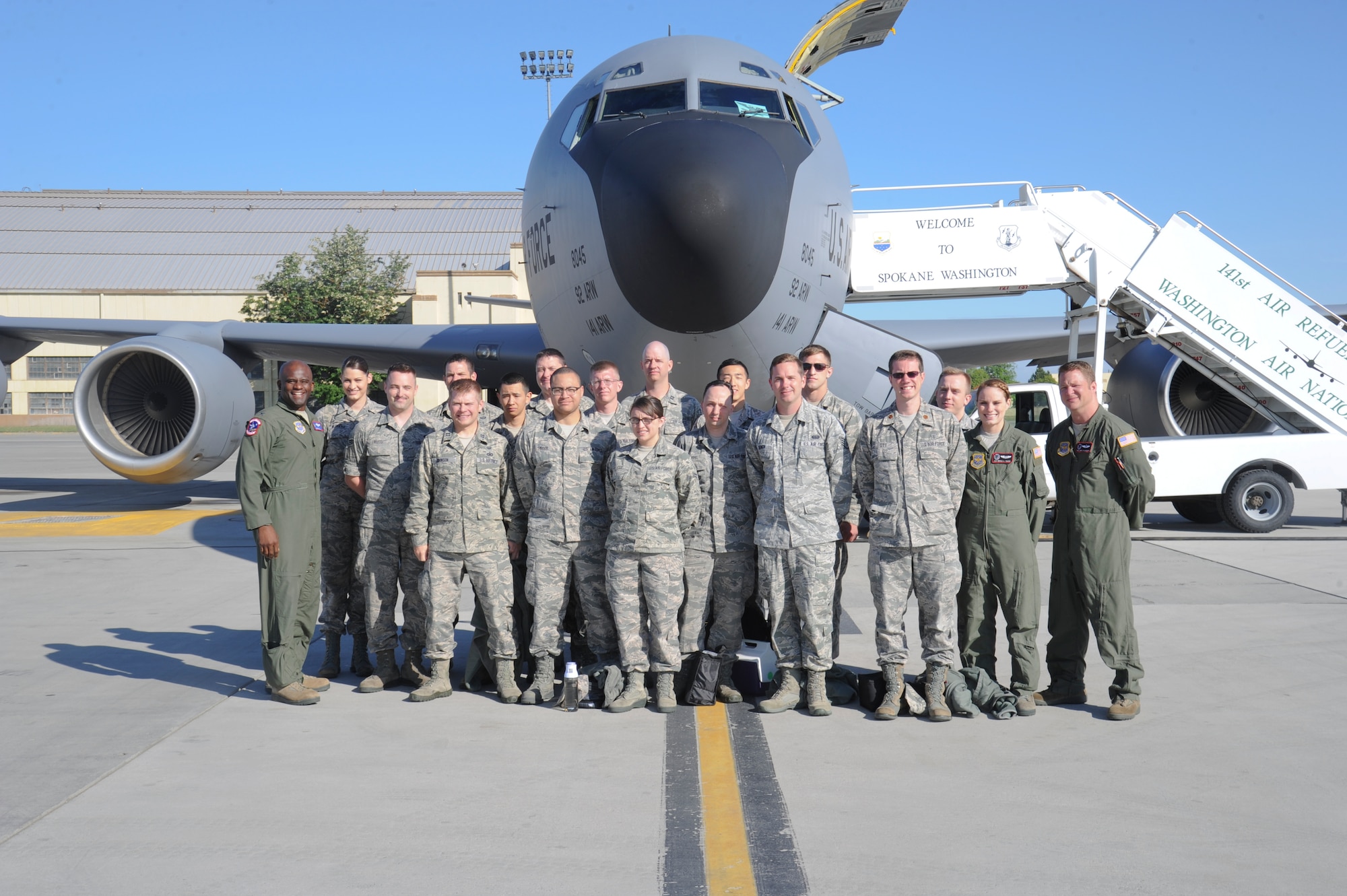 Col. Brian Hill, 92nd Air Refueling Wing vice commander, poses with a group of Airmen on the flightline May 27, 2015, at Fairchild Air Force Base, Wash. Hill was the aircraft commander during the incentive flight. (U.S. Air Force photo/Airman 1st Class Nicolo J. Daniello)