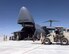 615th Air Mobility Group personnel unload equipment from a U.S. Air Force C-5 Galaxy at an operating base in Southwest Asia Feb. 11, 1998 in support of Operation SOUTHERN WATCH, which established and enforced a no-fly zone over Iraq. U.S. Air Force personnel from the 715th and 815th Air Mobility Squadron operated as a Tanker Airlift Control Element (TALCE), controlling all U.S. airlift traffic in and out of their deployed location. The 615th, 715th and 815th were deployed from Travis Air Force Base, Calif.  (U.S. Air Force photo by Staff Sgt. Efrain Gonzalez)