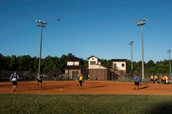 Airmen from the 628th Logistics Readiness Squadron scramble to catch the ball, May 29, 2015 at Joint Base Charleston, S.C., during a Sexual Assault Prevention and Response kickball event. The event was held by the 628th Communications Squadron to help promote sexual assault awareness. (U.S. Air Force photo/Senior Airman Jared Trimarchi) 