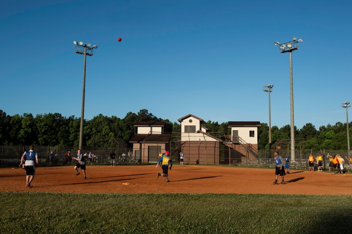 Airmen from the 628th Logistics Readiness Squadron scramble to catch the ball, May 29, 2015 at Joint Base Charleston, S.C., during a Sexual Assault Prevention and Response kickball event. The event was held by the 628th Communications Squadron to help promote sexual assault awareness. (U.S. Air Force photo/Senior Airman Jared Trimarchi) 