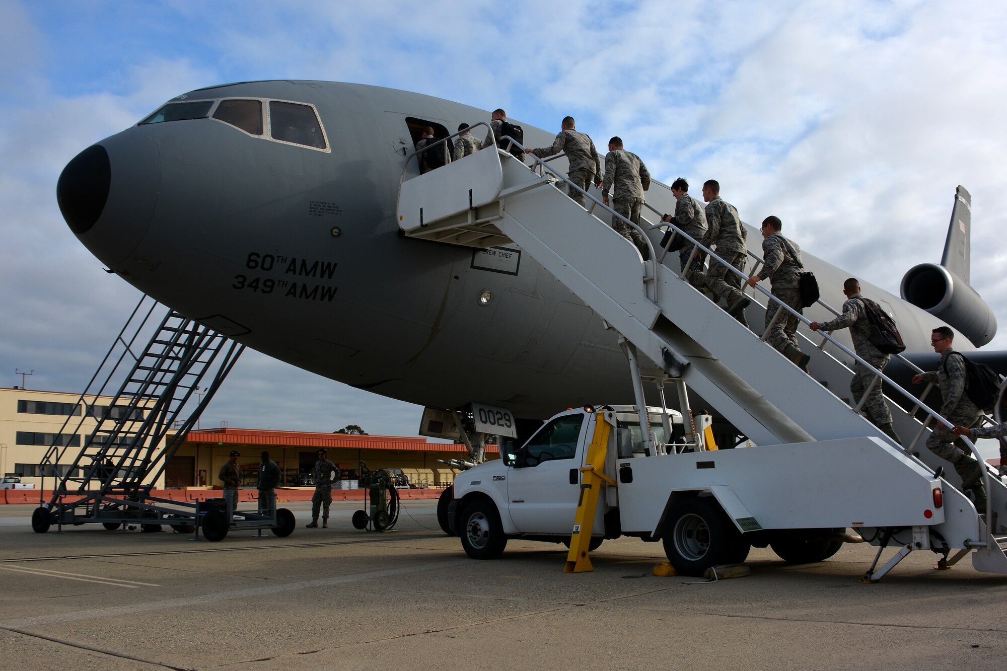 First-term Airmen board a KC-10 Extender May 21, 2015, as part of a new initiative to expose junior Airmen to the Travis mission. (U.S. Air Force photo by Senior Airman Charles Rivezzo)