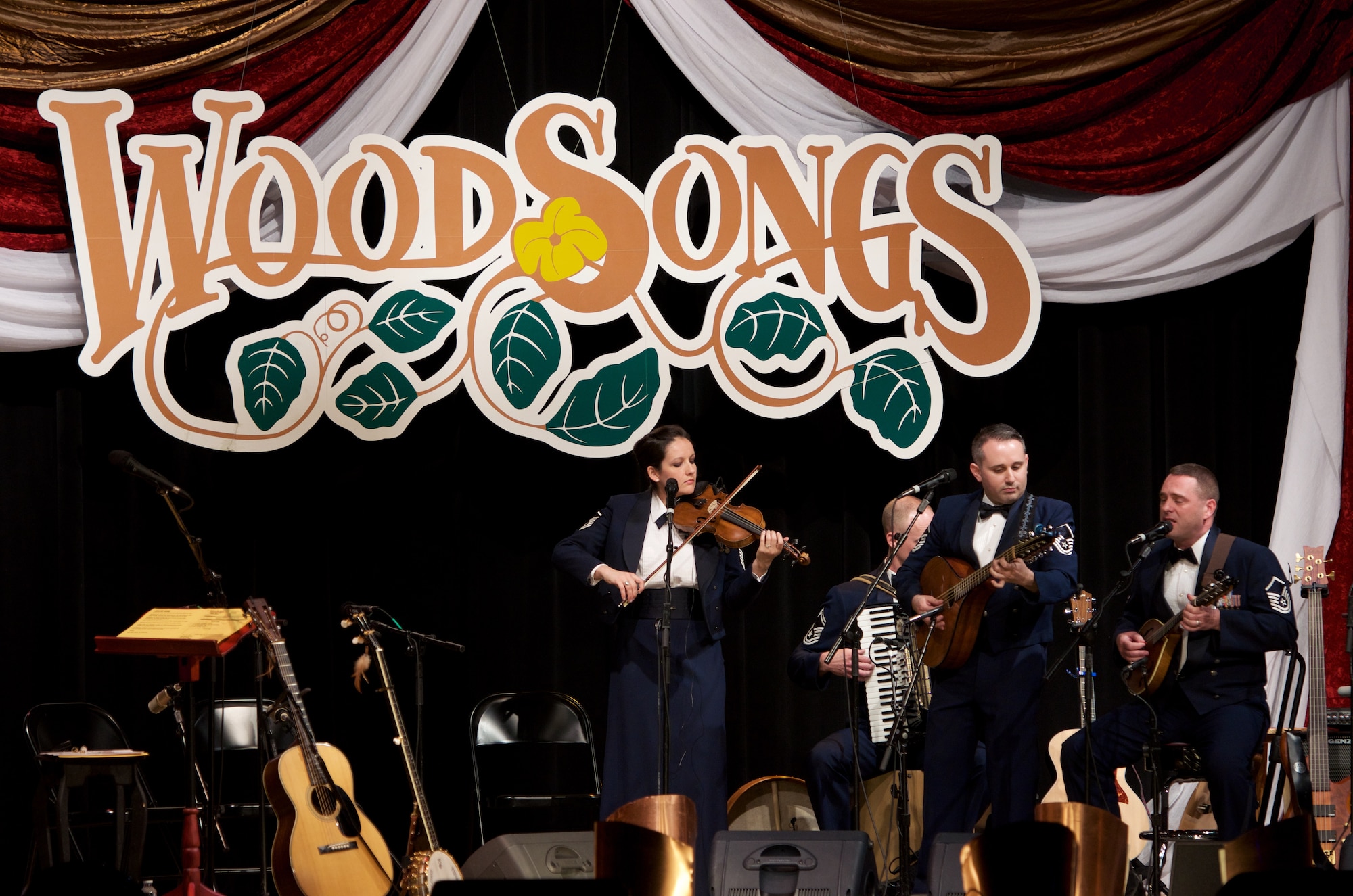 Celtic Aire performs on Michael Johnathon's WoodSongs Old-Time Radio Hour at the Lyric Theatre in Lexington, Kentucky, on Tuesday, April 28. The group performed four selections which will be broadcast on PBS and the American Forces Network later this summer. (U.S. Air Force photo by Senior Master Sgt. Bob Kamholz/released)