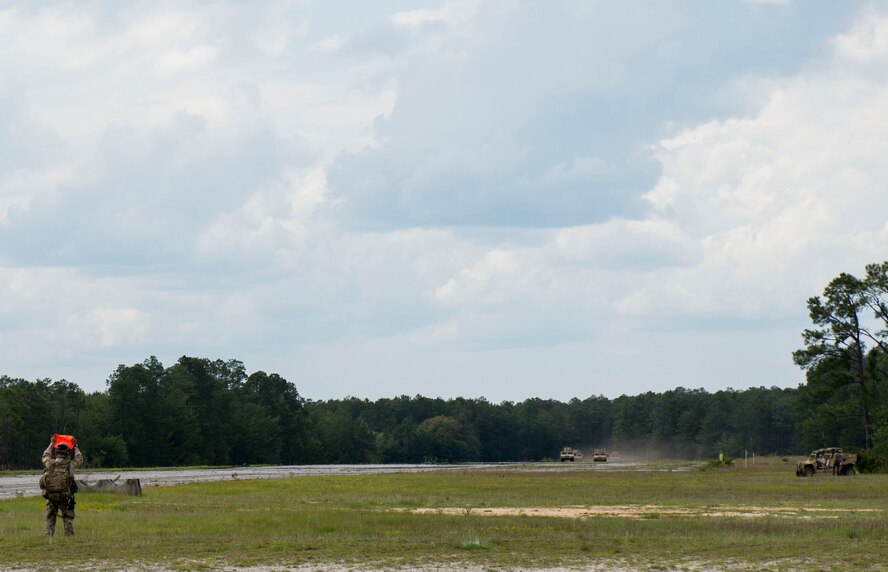 Special Tactics Airmen from the Special Tactics Training Squadron, 24th Special Operations Wing, Hurlburt Field, Fla., perform security operations during a runway security training exercise at Eglin Range, Fla., April 23, 2015. The STTS delivers advanced and special tactics skills to a wide variety of joint special operations career fields, including combat controllers and special tactics pararescuemen. (U.S. Air Force photo/ Tech. Sgt. Jasmin Taylor)