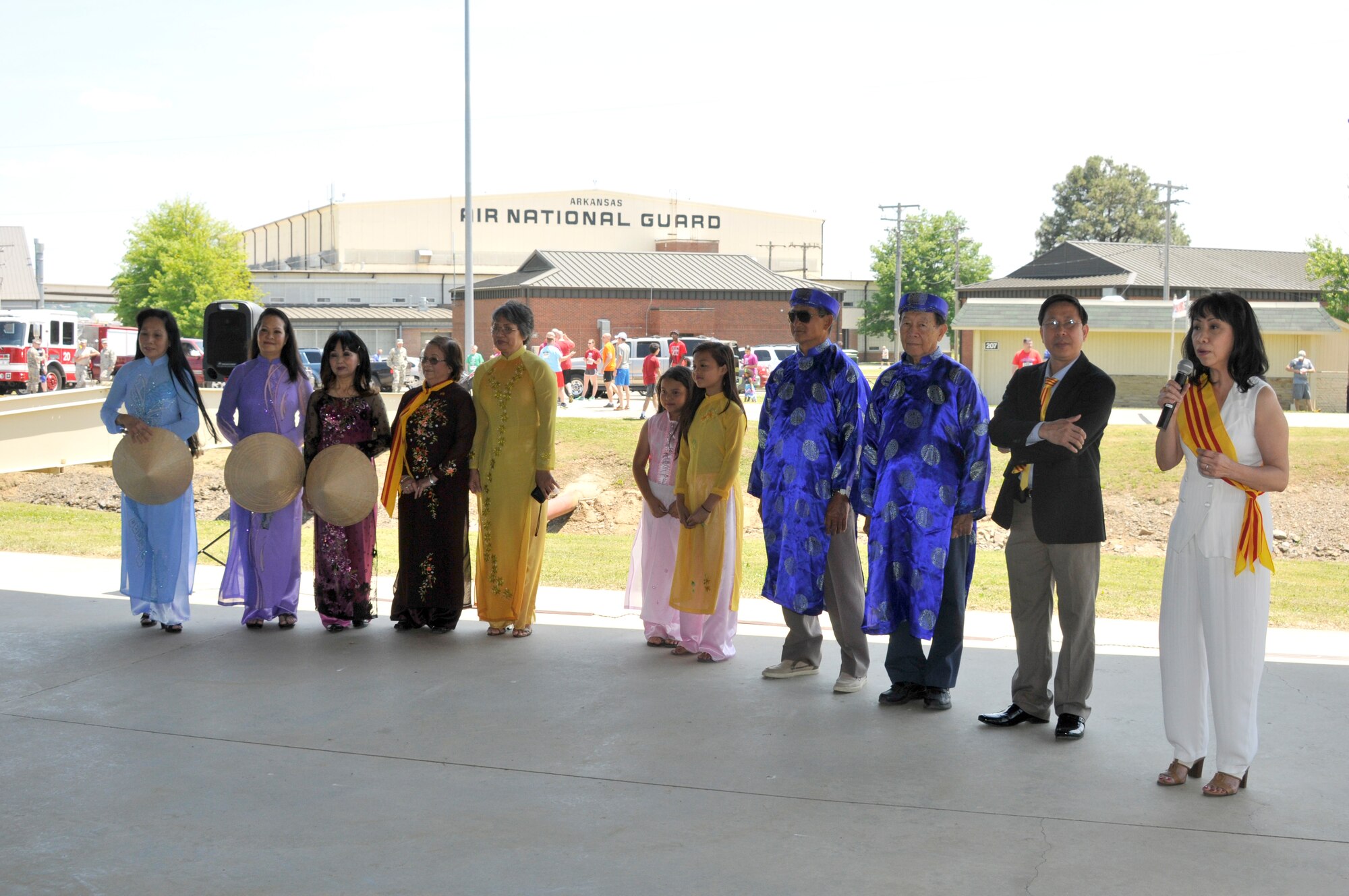 Members of the Vietnamese community in the Fort Smith, Arkansas area exhibit traditional cultural attire during an Asian American-Pacific Islander Heritage Month  event held May 2, 2015, as part of a Family Day hosted on Ebbing Air National Guard Base, Fort Smith, Ark. (U.S. Air National Guard photo by Staff Sgt. John Suleski/Released)