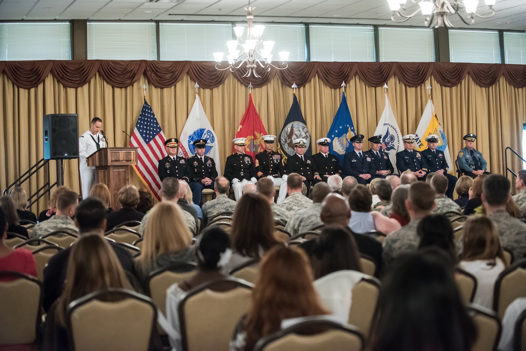More than 300 service members representing all branches joined joint base leaders in the 33rd Annual Parade of Wreaths honoring fallen warriors May 21, 2015, at Tommy B’s Community Activities Center at Joint Base McGuire-Dix-Lakehurst, N.J. The Parade of Wreaths ceremony began in 1982 with the donation of a plaque for service members killed or missing in action. (U.S. Air Force photo by Russell Meseroll/Released)