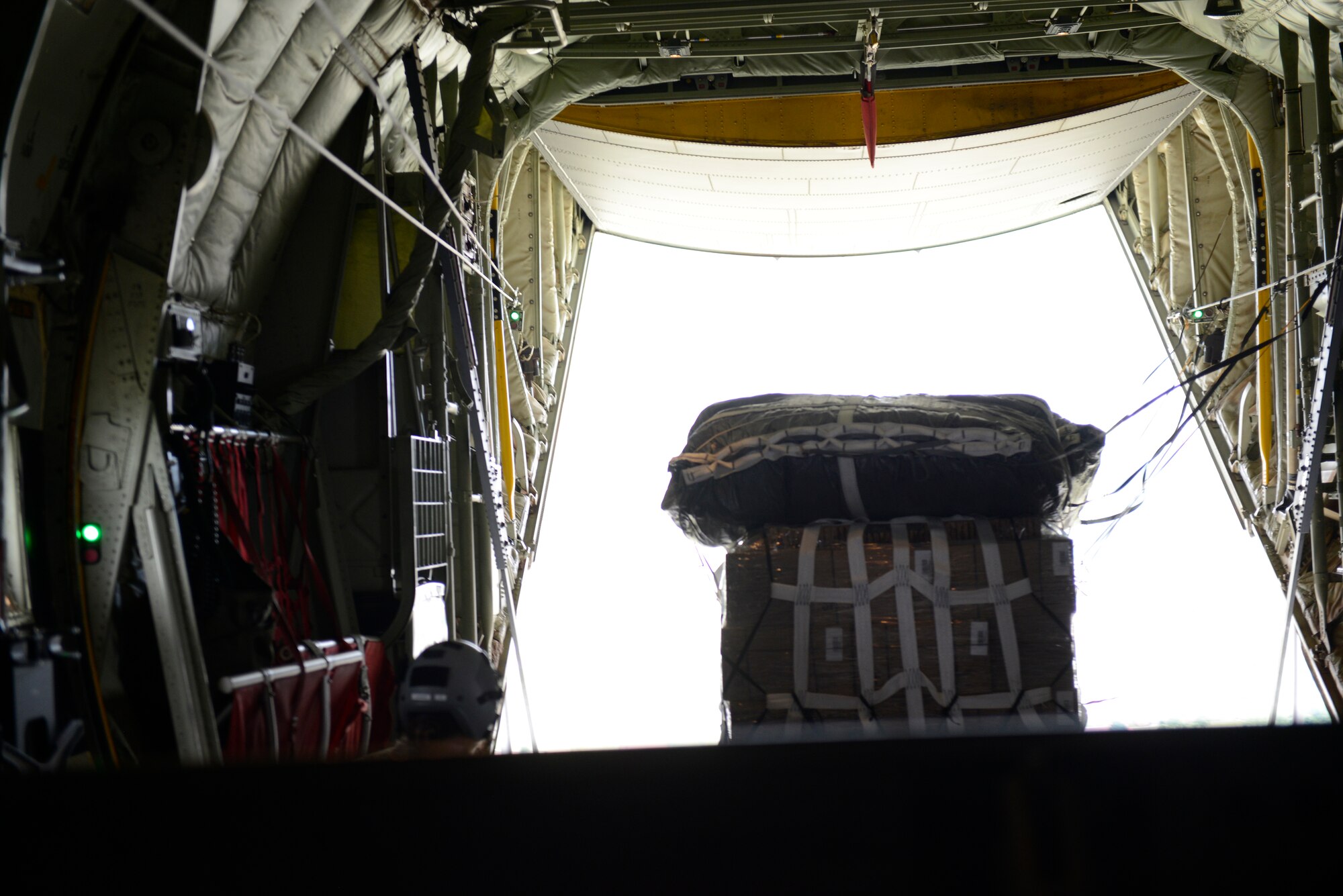 A pallet of supplies is released from a C-130J Super Hercules during an airdrop training exercise May 27, 2015, over Kosovo. Four pallets were dropped during the exercise and contained Meals, Ready-to-Eat and water. (U.S. Air Force photo/Airman 1st Class Tryphena Mayhugh)