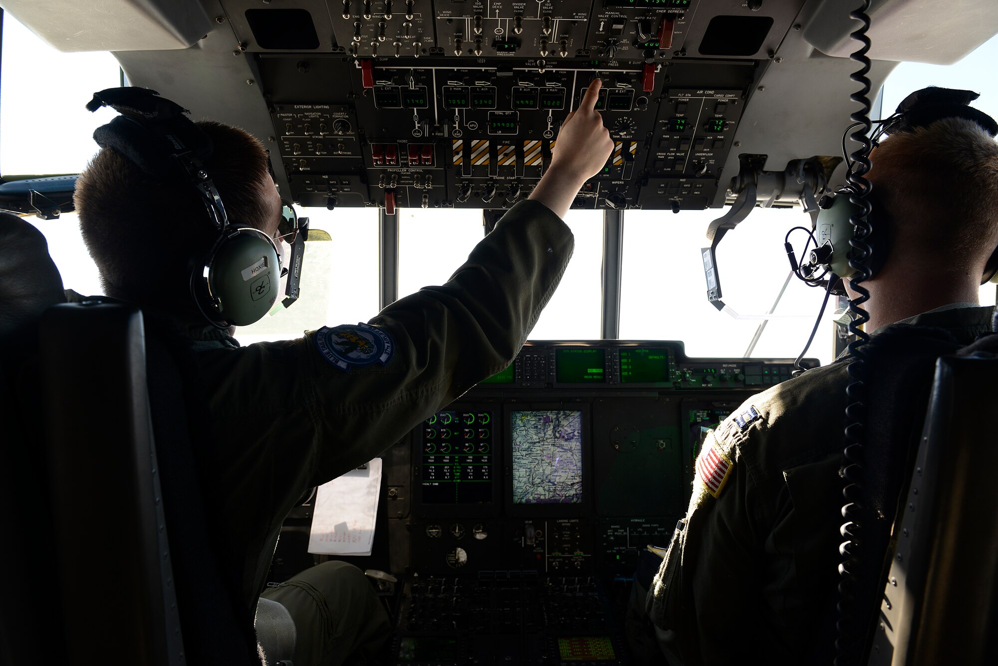 Capts. Derrick Hoxie and Kirk Habrun, 37th Airlift Squadron pilots, fly a C-130J Super Hercules in transit to Kosovo for an airdrop training exercise May 27, 2015. Airmen from the 37th AS worked alongside Soldiers from the 5th Quartermaster Company, Theatre Aerial Delivery Company, to perform the exercise. (U.S. Air Force photo/Airman 1st Class Tryphena Mayhugh)