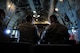 U.S. Air Force Senior Airman Michael Garcia, left, and Senior Airman David Ringer, from the New Jersey Air National Guard's 177th Civil Engineering Squadron, talk while taking a flight on a C-130 Hercules from Coast Guard Air Station Clearwater, Fla., on  May 22, 2015. The civil engineering Airmen were in Florida for a deployment for training and were able to tour the air station and take a ride before Memorial Day weekend. (U.S. Air National Guard photo by Airman 1st Class Amber Powell/Released)