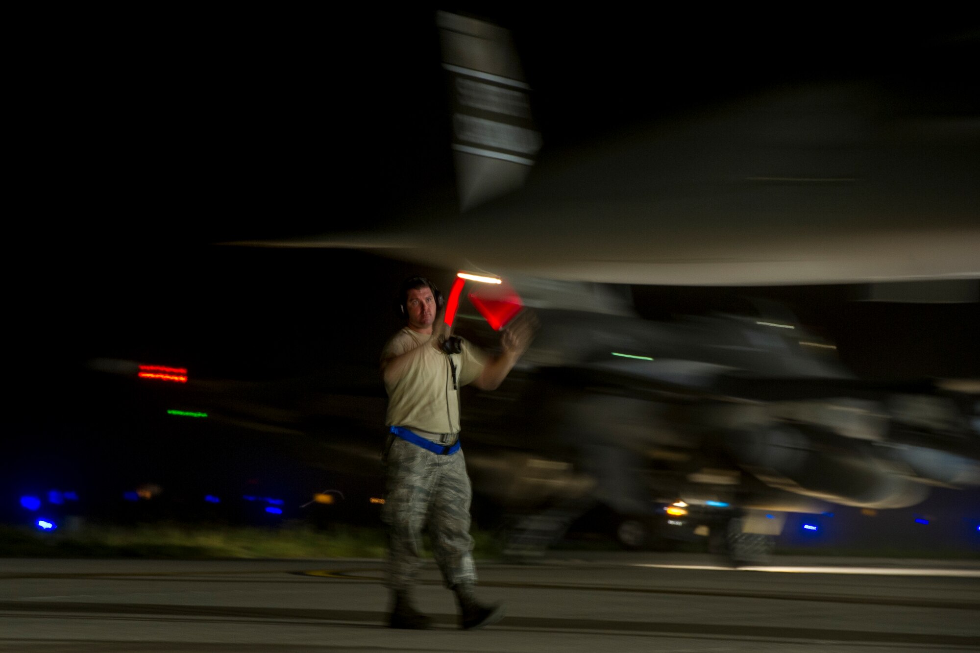 U.S. Air Force Senior Airman David Cox U.S. from the South Carolina Air National Guard???s 169th Fighter Wing at McEntire Joint National Guard Base, S.C., marshals an F-16 Block 52 Fighting Falcon before its departure in support of Operation Atlantic Resolve in Poland, May 28, 2015. The training mission, called an Aviation Detachment, will pair Swamp Fox F-16 pilots and maintenance crews with their Polish Air Force counterparts at ??ask Air Base during Operation Atlantic Resolve. This bilateral training, held by US Air Forces Europe and Air Forces Africa, has taken place since 2012. Through strengthened relationships and engagements with our allies, the U.S. and NATO demonstrate their shared commitment to a peaceful, stable and secure Europe. (South Carolina Air National Guard photo by Tech. Sgt. Jorge Intriago / RELEASED)
