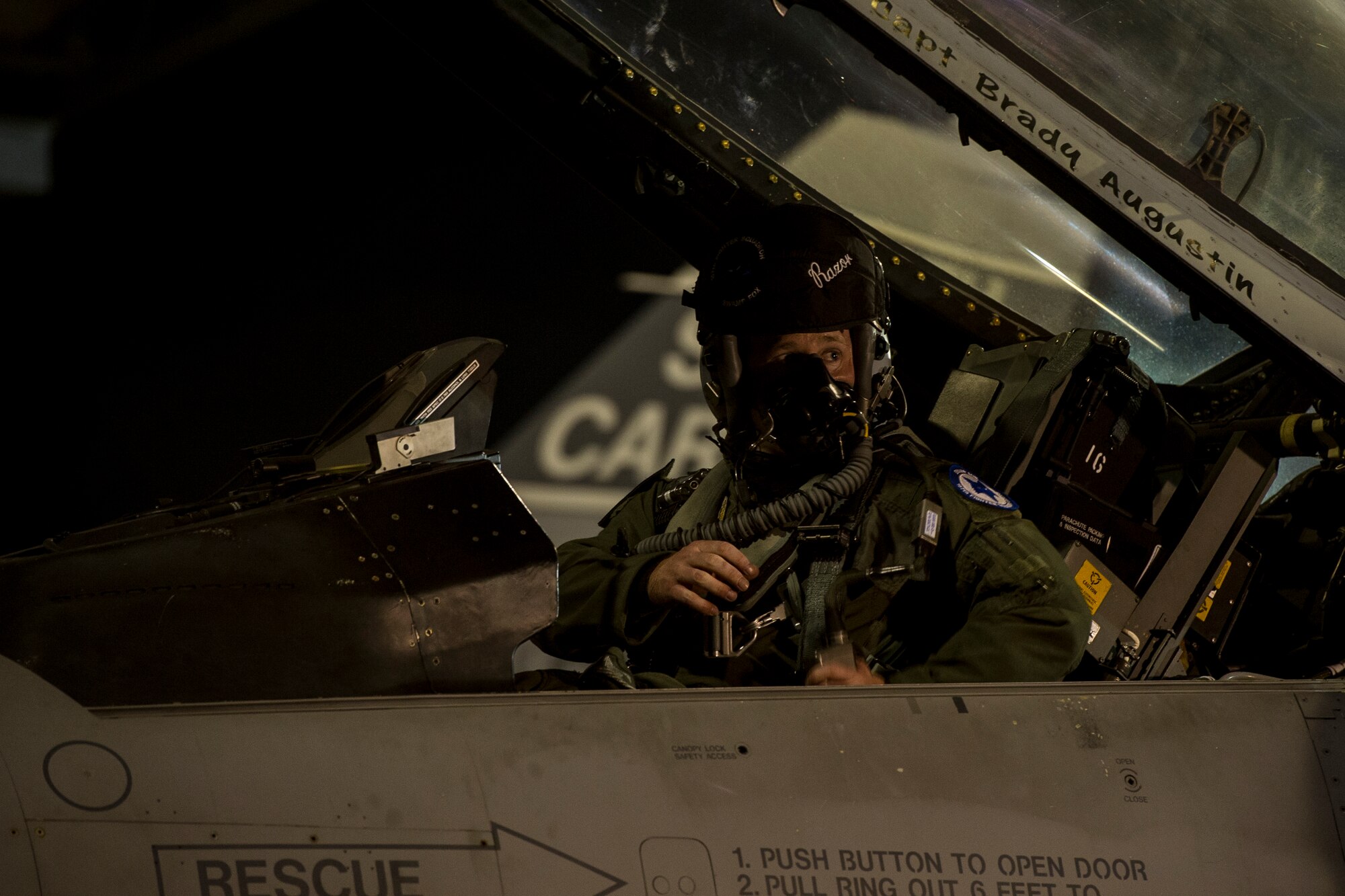 U.S. Air Force Maj. Justin Puro from the South Carolina Air National Guard???s 169th Fighter Wing at McEntire Joint National Guard Base, S.C., makes final adjustments inside the cockpit before taking off for ??ask Air Base, Poland, May 28, 2015. The 169th Fighter Wing is supporting Operation Atlantic Resolve in Poland, The training mission, called an Aviation Detachment, will pair Swamp Fox F-16 pilots and maintenance crews with their Polish Air Force counterparts at during Operation Atlantic Resolve. This bilateral training, held by U.S. Air Forces Europe and Air Forces Africa, has taken place since 2012. Through strengthened relationships and engagements with our allies, the U.S. and NATO demonstrate their shared commitment to a peaceful, stable and secure Europe. (South Carolina Air National Guard photo by Tech. Sgt. Jorge Intriago / RELEASED)