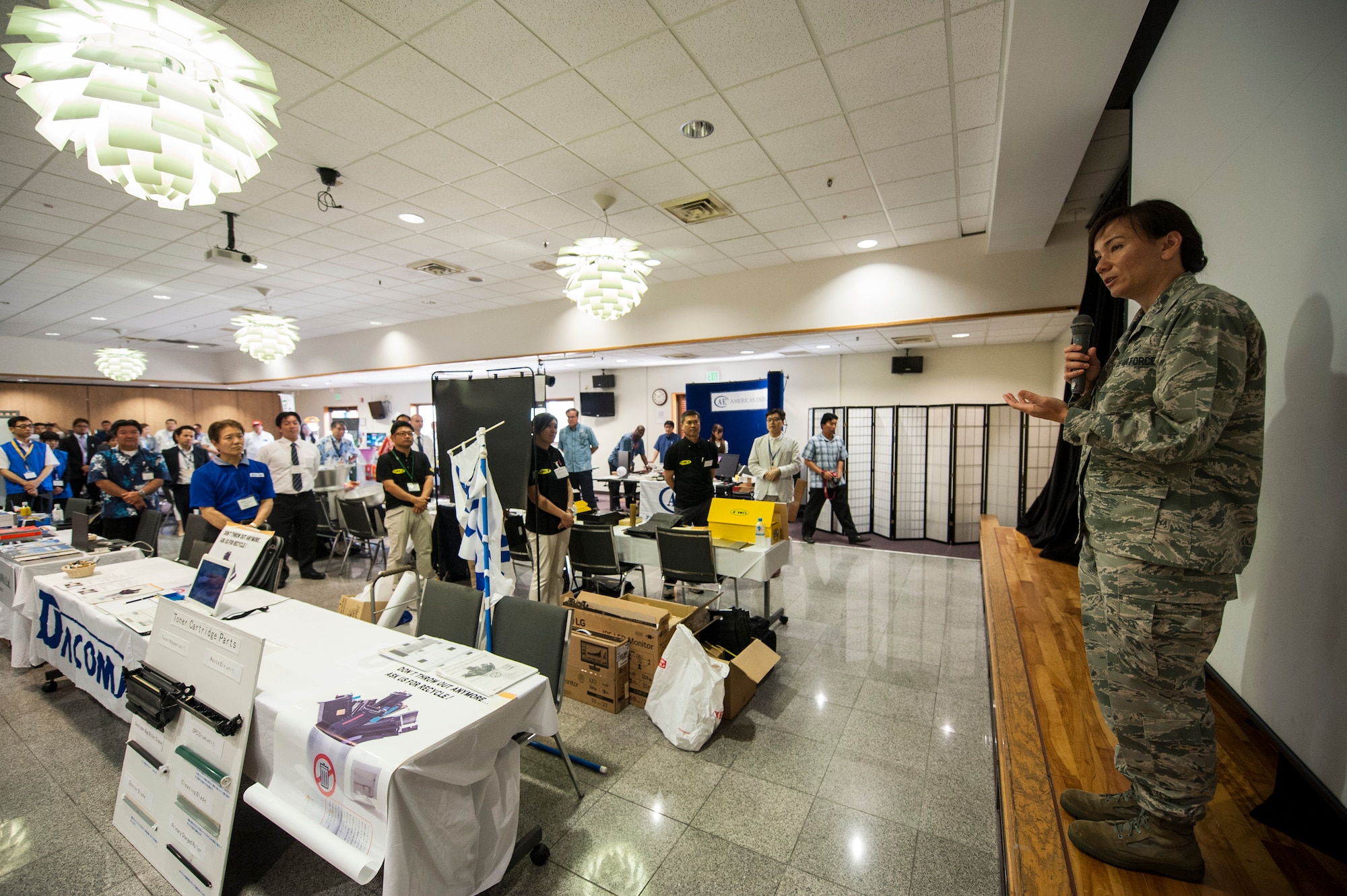 U.S. Air Force Col. Deborah Lovette, 18th Mission Support Group commander, gives opening remarks at the 2015 Okinawa First Vendor Showcase on Kadena Air Base, Japan, May 29, 2015. The Okinawan vendors showcased locally made products to the Government Purchase Cardholders, unit resource advisors and Airmen in management positions. (U.S. Air Force photo by Senior Airman Stephen Eigel)