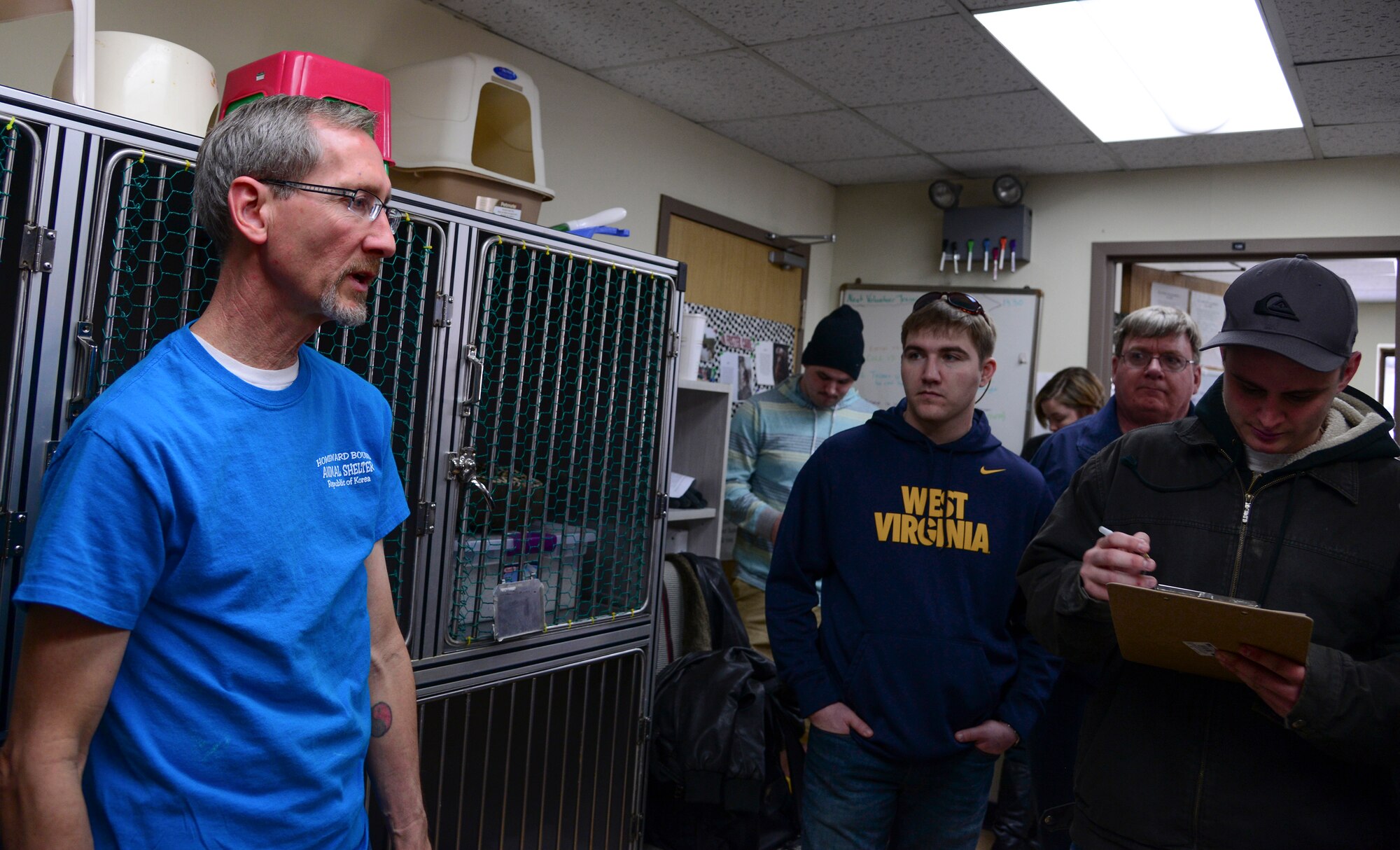 Steve Blake, Air Force Audit Agency team chief and Homeward Bound Osan Animal Shelter volunteer coordinator, conduncts volunteer training, March 14, 2015, at Osan Air Base, Republic of Korea. The shelter does volunteer training on the second Saturday and the fourth Sunday of every month. (U.S. Air Force photo by Senior Airman Matthew Lancaster)