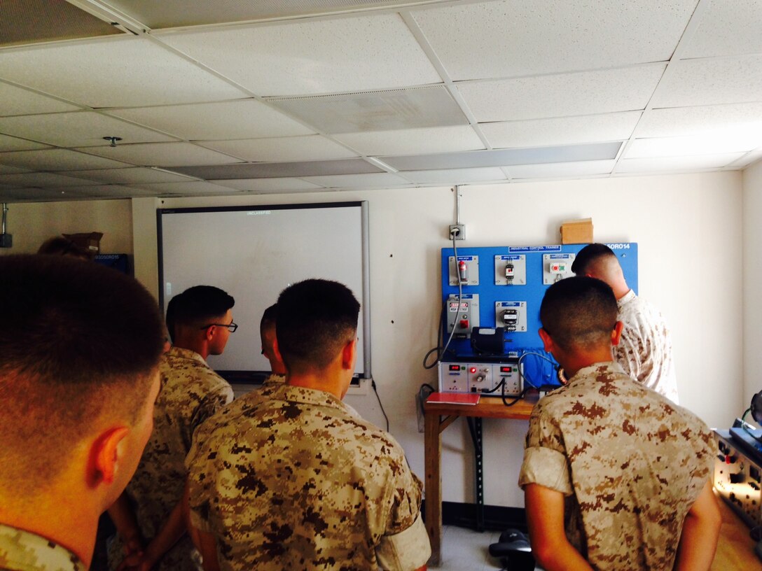 Marines from BEEEST 6-15 learn about motors.