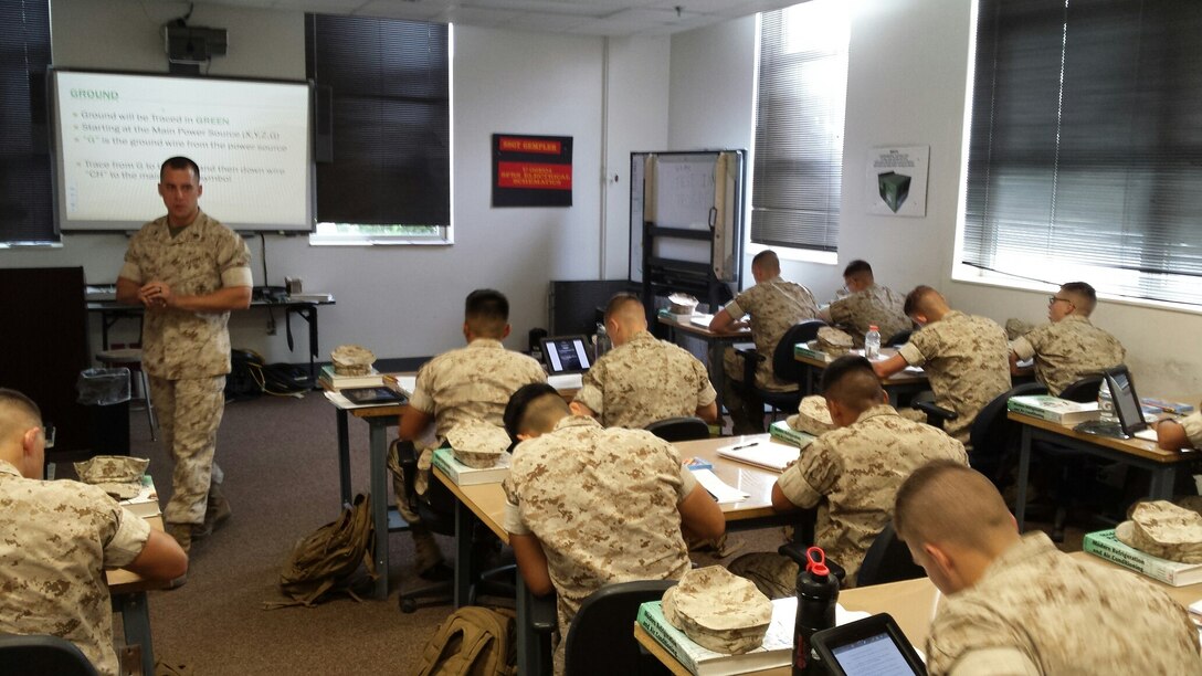 Marines from BRACT 3-15 learn about schematics.