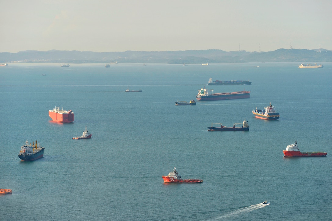 From the overlook of the Marina Bay Sands resort, cargo ships transit the busy Strait of Malacca in Singapore, May 29, 2015.