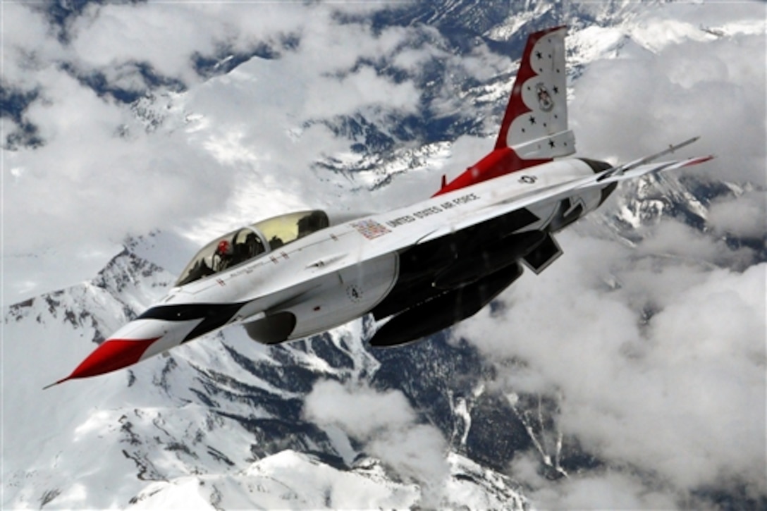 Air Force Maj. Curtis Doughtery flies his aircraft over the Rocky Mountains after an aerial refueling, May 21, 2015. Doughtery is a slot pilot for the Air Force Air Demonstration Squadron, the Thunderbirds. 