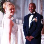 Chief Master Sgt. Troy McComb, 47th Medical Group superintendent, smiles with his wife Gina at their vow renewal in 2012. (Courtesy Photo) 