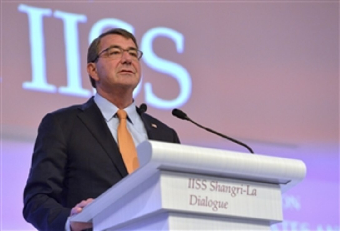 U.S. Defense Secretary Ash Carter delivers the keynote address to kick off the Shangri-La Dialogue in Singapore, May 30, 2015. Carter spoke of strengthening relations between Asia-Pacific nations and countered provocative land reclamation efforts by China. Also known as the Asia Security Summit, the dialogue aims to build confidence and fostering practical security cooperation among Asian nations.