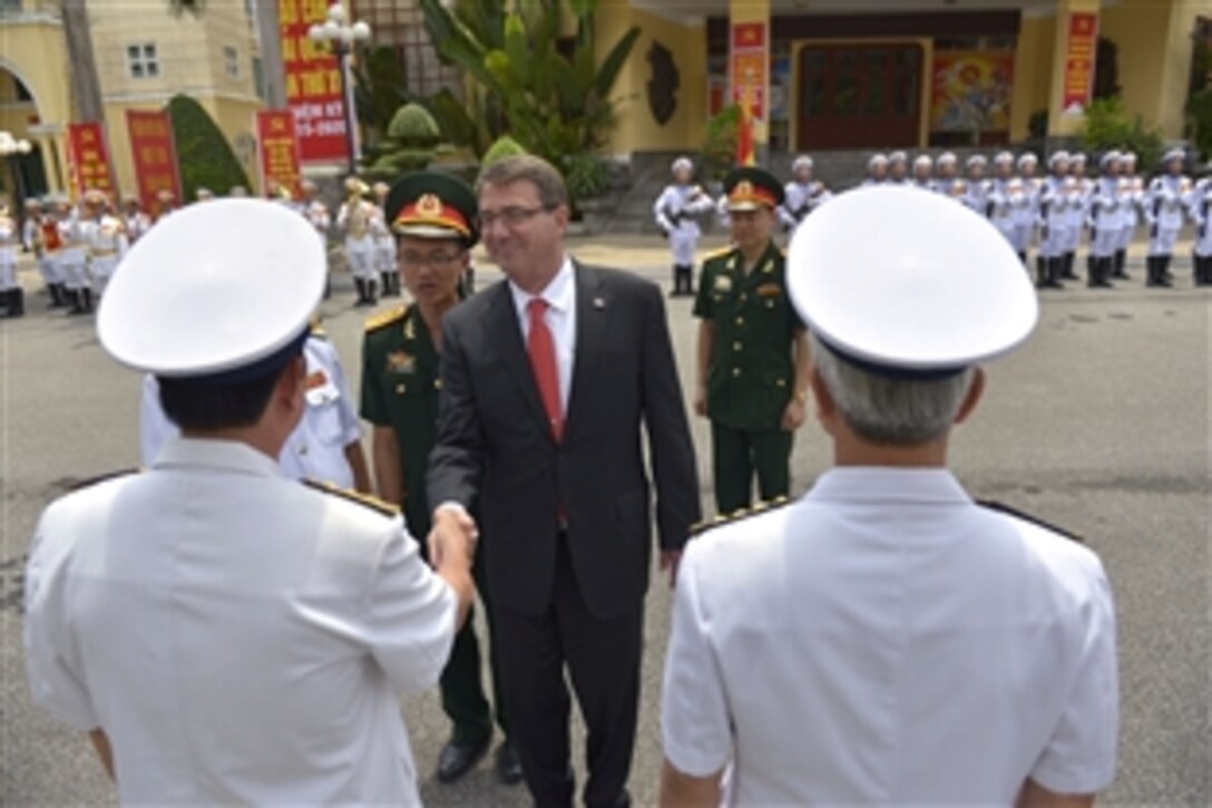 Defense Secretary Ash Carter is introduced to senior officers of the People's Navy of Vietnam during a welcoming ceremony, May 31, 2015. Carter is on a 10-day trip to the Asia-Pacific region  to meet with partner nations and affirm U.S. commitment to the area. 