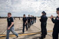 U.S. Air Force Aerial Demonstration Squadron “Thunderbirds” officers congratulate new Air Force recruits at Joint Base San Antonio-Randolph Oct. 31, 2015. The new AF recruits performed an oath of enlistment before the U.S. Thunderbirds performance at the 2015 JBSA Air Show & Open House at JBSA-Randolph. In attendance were friends and family who witnessed the enlistment. (U.S. Air Force photo by photo by Johnny Saldivar)