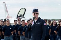 Lt. Col. Christopher Hammond, commander/leader of the U.S. Air Force Air Demonstration Squadron, adresses the crowd before administering the oath of enlistment to new Air Force recruits at Joint Base San Antonio-Randolph Oct. 31, 2015. The enlistment was before the U.S. Thunderbirds performance at the 2015 JBSA Air Show & Open House at JBSA-Randolph. In attendance were friends and family who witnessed the enlistment.(U.S. Air Force photo by photo by Johnny Saldivar)