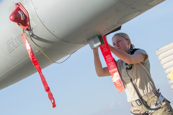 Airman 1st Class Justina Richard, a 455th Expeditionary Aircraft Maintenance Squadron crew chief, deployed from Hill Air Force Base, Utah, performs post-flight maintenance on an F-16 Fighting Falcon at Bagram Airfield, Afghanistan, Oct. 30, 2015. Airmen assigned to the 421st Fighter Squadron, known as the “Black Widows,” from Hill Air Force Base, Utah, arrived here Oct. 28, 2015 in support of Operation Freedom’s Sentinel and NATO’s Resolute Support mission. (U.S. Air Force photo/Tech. Sgt. Robert Cloys) 