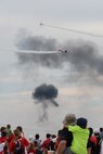 The Tora Tora Tora demonstration group performs a reenactment of the Japanese attack on Pearl Harbor Dec. 7, 1941, while a crowd watches during the 2015 Joint Base San Antonio Air Show and Open House Oct. 31, 2015 at JBSA-Randolph. Air shows allow the Air Force to display the capabilities of our aircraft to the American taxpayer through aerial demonstrations and static displays and allowing attendees to get up close and personal to see some of the equipment and aircraft used by the U.S. military today. (U.S. Air Force photo by Senior Airman Krystal Wright)