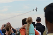 The Tora Tora Tora demonstration group performs a reenactment of the Japanese attack on Pearl Harbor Dec. 7, 1941, while a crowd watches during the 2015 Joint Base San Antonio Air Show and Open House Oct. 31 at JBSA-Randolph. There was also a demonstration by the U.S. Air Force Aerial Demonstration Squadron,  “Thunderbirds;” The U.S. Air Force Parachute Team, “Wings of Blue;” and the U.S. Army Parachute Team, “Golden Knights.” (U.S. Air Force photo by Senior Airman Krystal Wright)