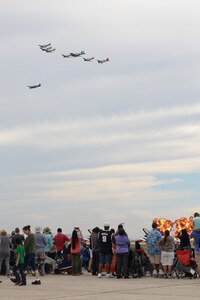 The Tora Tora Tora demonstration group performs a reenactment of the Japanese attack on Pearl Harbor Dec. 7, 1941, while a crowd watches during the 2015 Joint Base San Antonio Air Show and Open House Oct. 31 at JBSA-Randolph. There was also a demonstration by the U.S. Air Force Aerial Demonstration Squadron,  “Thunderbirds;” The U.S. Air Force Parachute Team, “Wings of Blue;” and the U.S. Army Parachute Team, “Golden Knights.” (U.S. Air Force photo by Senior Airman Krystal Wright)