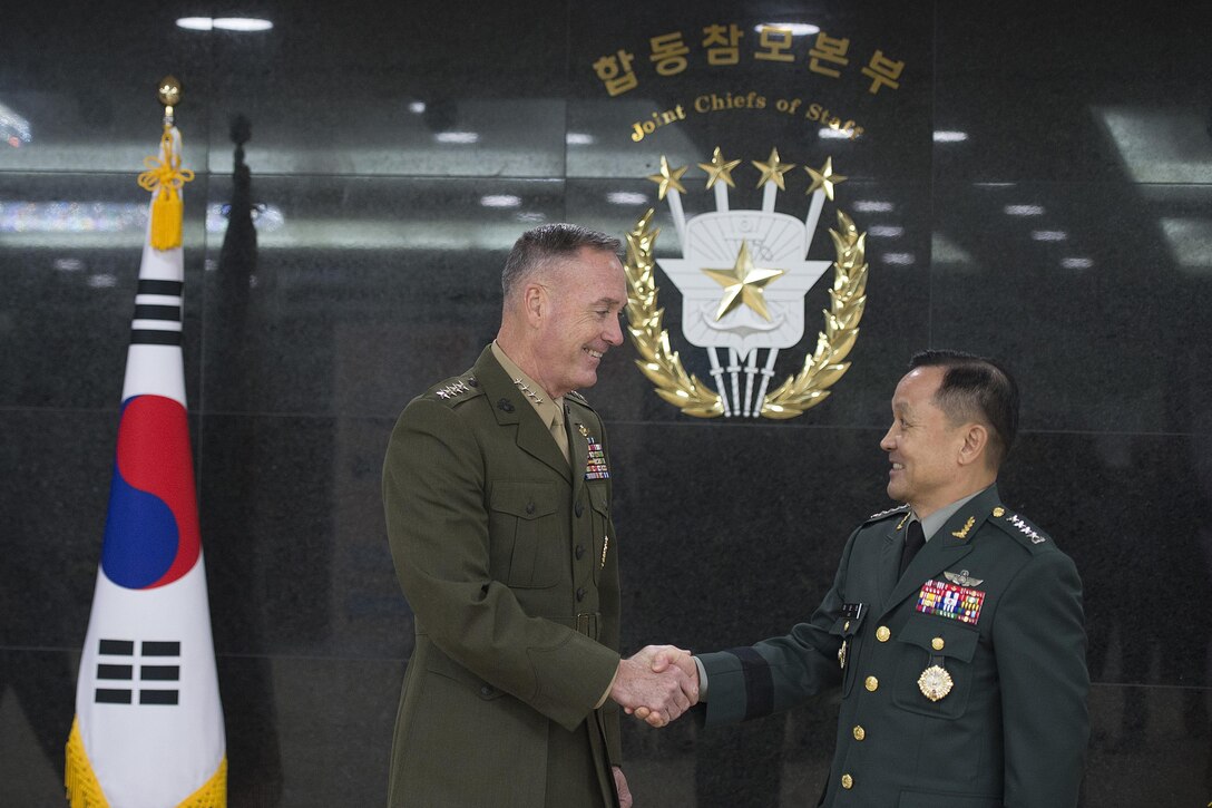 Marine Corps Gen. Joseph F. Dunford Jr., chairman of the Joint Chiefs of Staff, shakes hands with his Republic of Korea counterpart, Army Gen. Lee Soon-Jin, at the South Korean Joint Chiefs of Staff Headquarters in Seoul, Nov. 1, 2015. DoD photo by Navy Petty Officer 2nd Class Dominique A. Pineiro