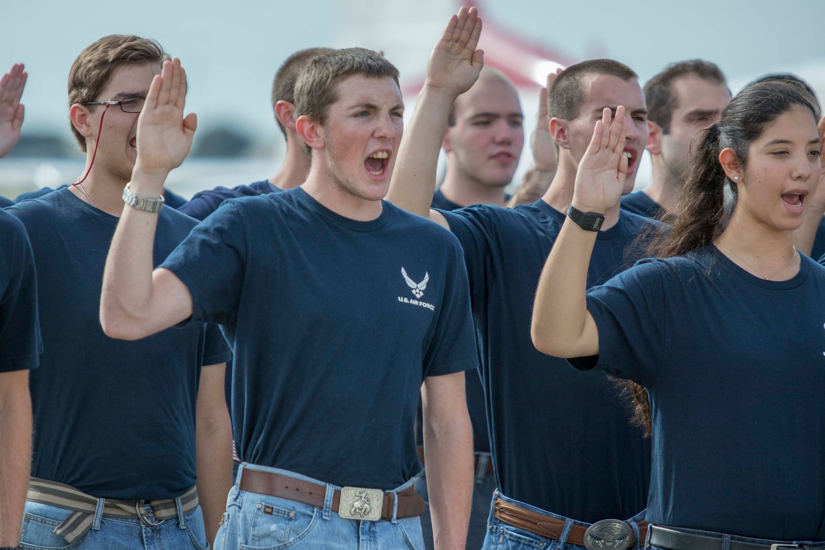 Anthony Langford from Lockhart, Texas enlists in the U.S. Air Force Oct. 31, 2015, as part of the events at the Joint Base San Antonio Air Show & Open House at JBSA-Randolph. In attendance were friends and family who witnessed the enlistment followed by the Thunderbirds performance.(U.S. Air Force photo by Joshua Rodriguez/Released)