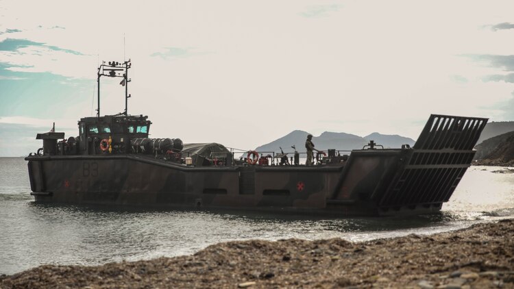 A British amphibious craft lands ashore on an island in the Mediterranean Sea during Trident Juncture 15, Oct. 21, 2015. Trident Juncture is one of many exercises ensuring that NATO is ready to deal with any emerging crisis from any direction, and that the Alliance is able to work effectively with partner nations. 