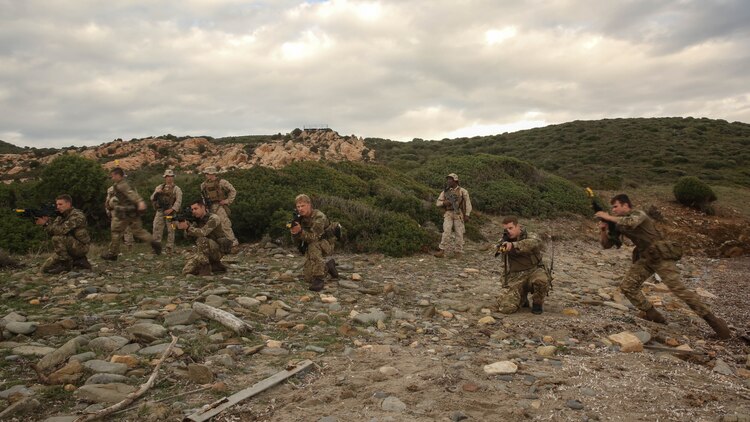 Royal Marines with 45 Commando demonstrate patrol movements during Trident Juncture 15, Oct. 21, 2015. Trident Juncture is one of many exercises ensuring that NATO is ready to deal with any emerging crisis from any direction, and that the Alliance is able to work effectively with partner nations. 