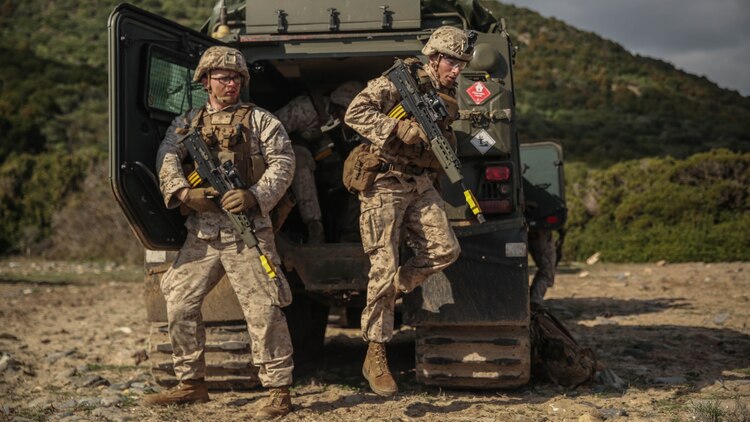 U.S. Marines with Special-Purpose Marine Air-Ground Task Force Crisis Response-Africa exit a British Viking during Trident Juncture 15, Oct. 22, 2015. Trident Juncture is one of many exercises ensuring that NATO is ready to deal with any emerging crisis from any direction, and that the Alliance is able to work effectively with partner nations. 