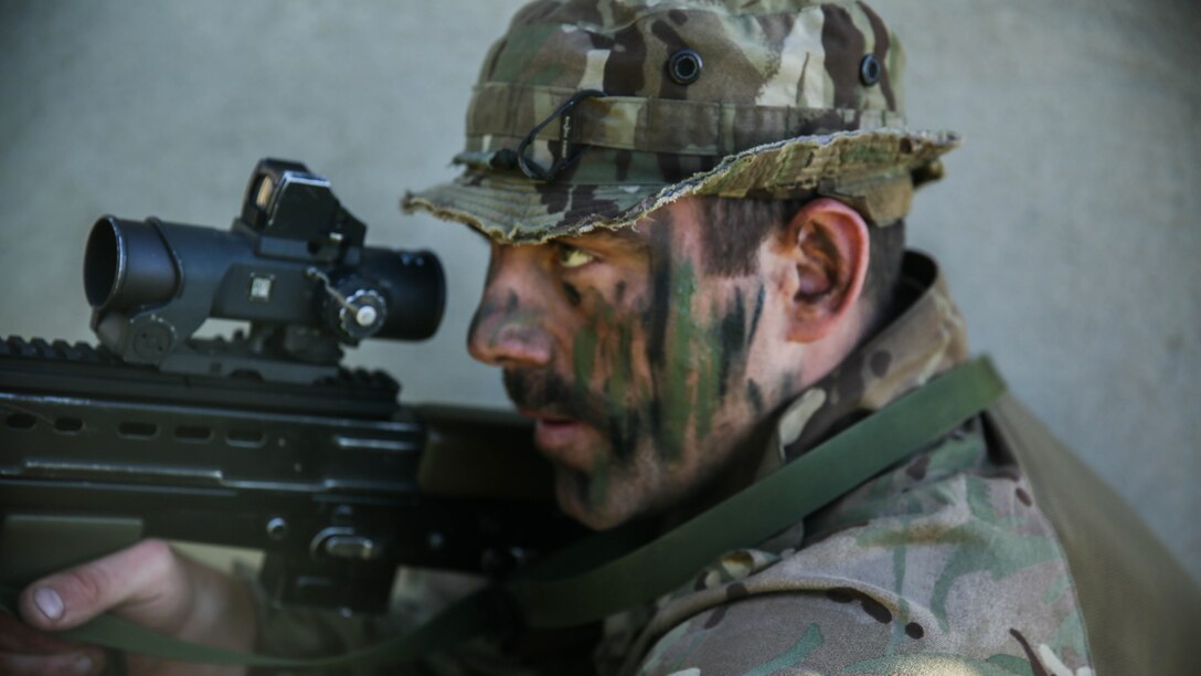 A Royal Marine with 45 Commando provides security during Trident Juncture 15, Oct. 23, 2015. Trident Juncture is one of many exercises ensuring that NATO is ready to deal with any emerging crisis from any direction, and that the Alliance is able to work effectively with partner nations. 